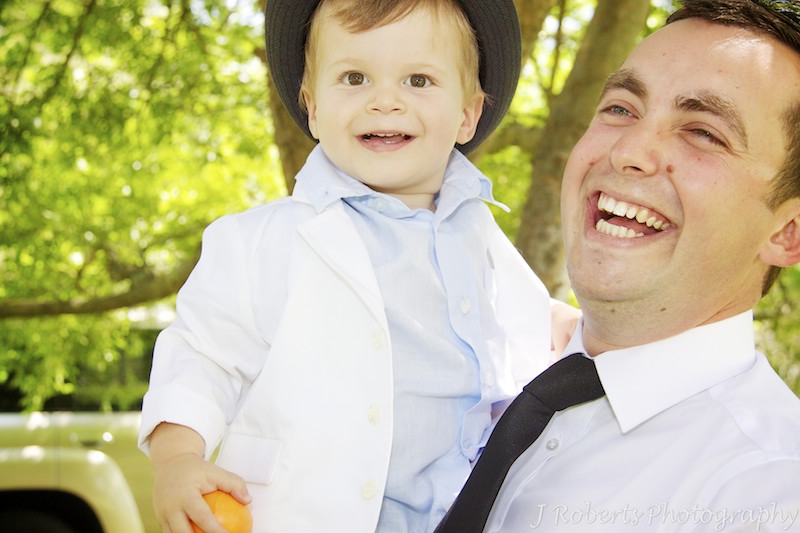 Groom laughing with his nephew - wedding photography sydney
